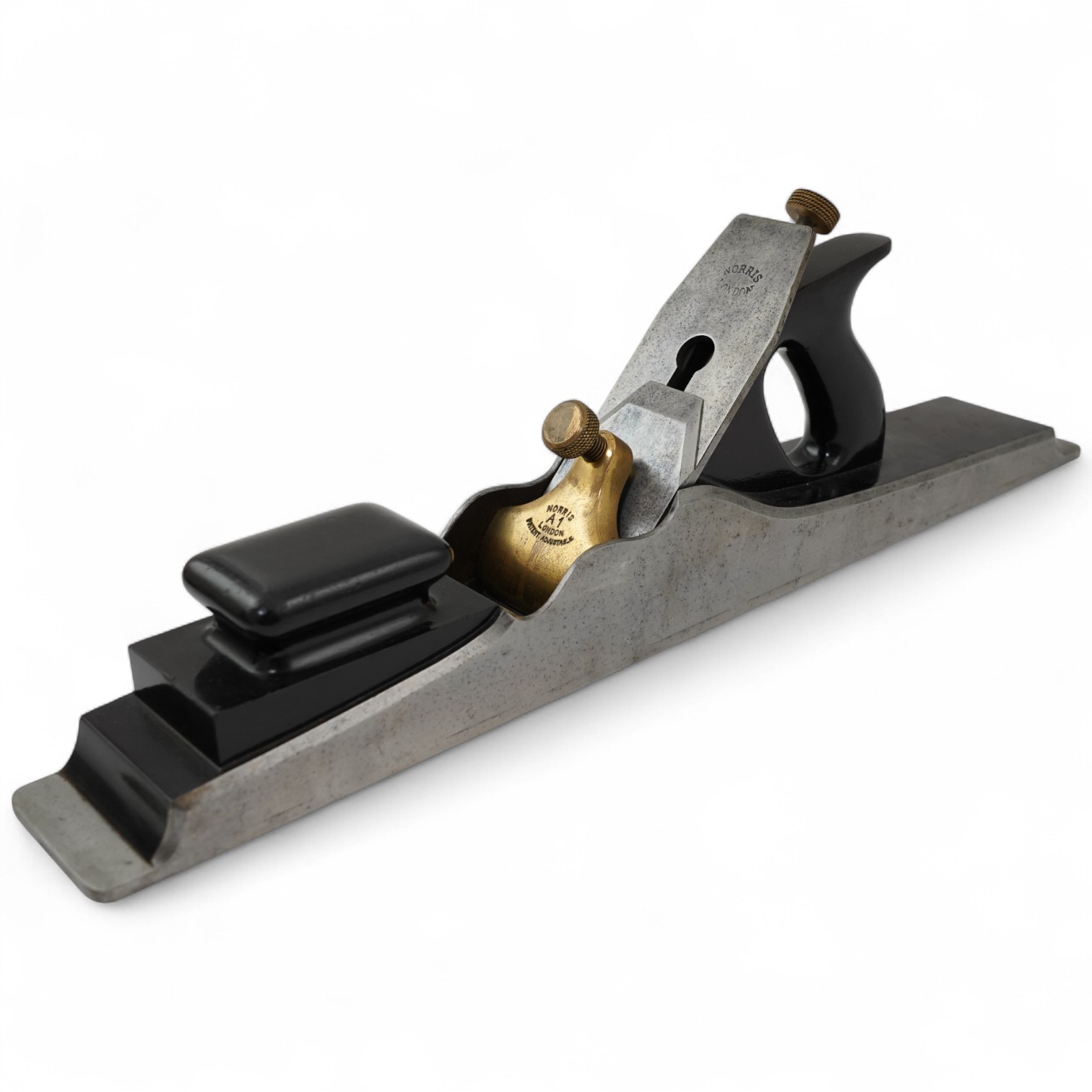 A Norris A1 adjustable 22 1/2” jointer plane with rosewood infill and handle, stamped with Norris, London to both the brass lever cap and the iron